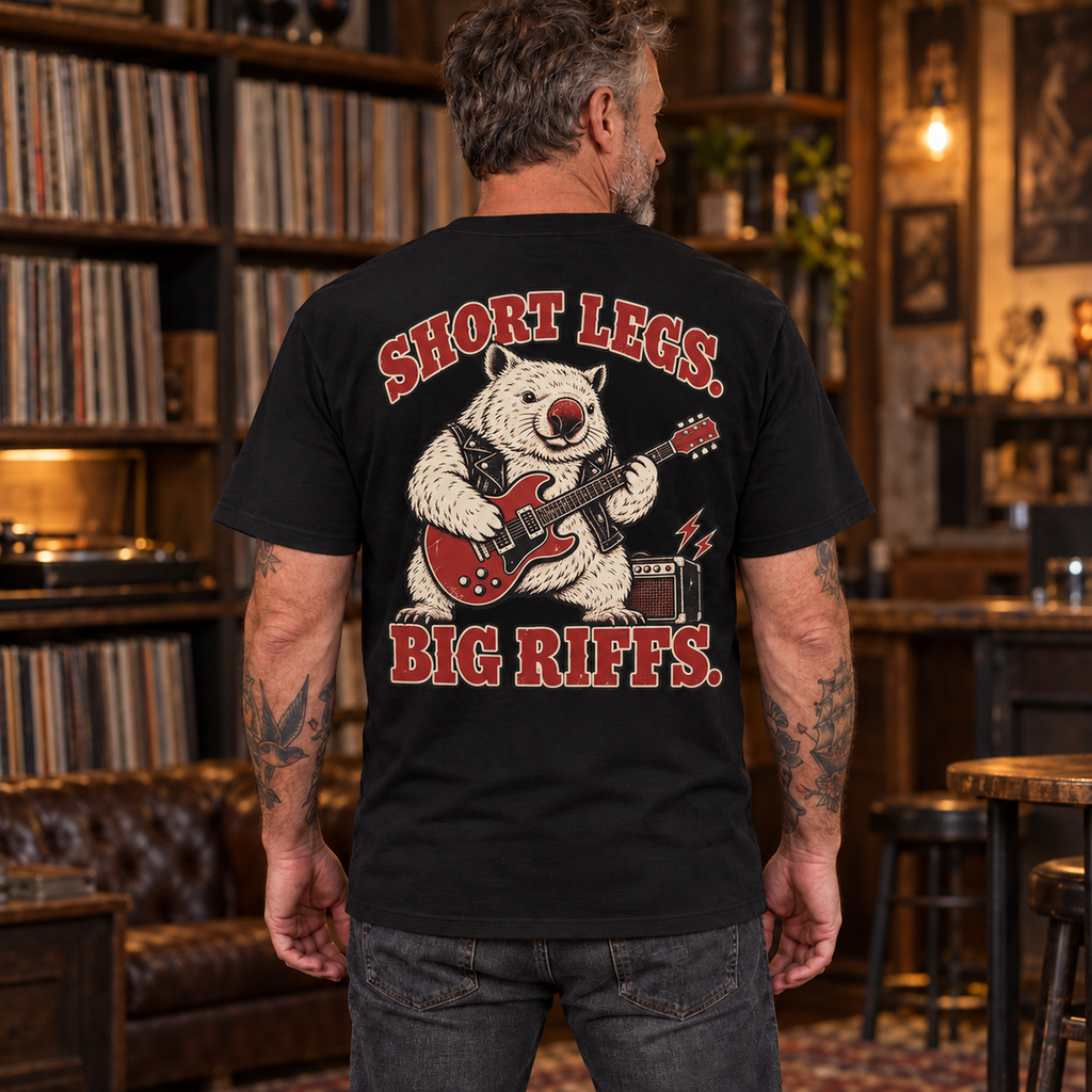Man wearing Short Legs Big Riffs Wombat heavyweight tee with back print