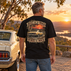 Built for the Road, Wired for Rock Heavyweight Tee — black back print worn in a classic-car setting