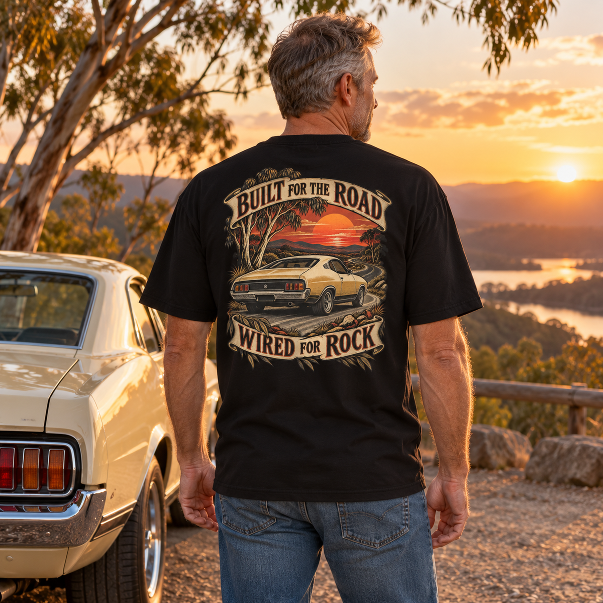 Built for the Road, Wired for Rock Heavyweight Tee — black back print worn in a classic-car setting