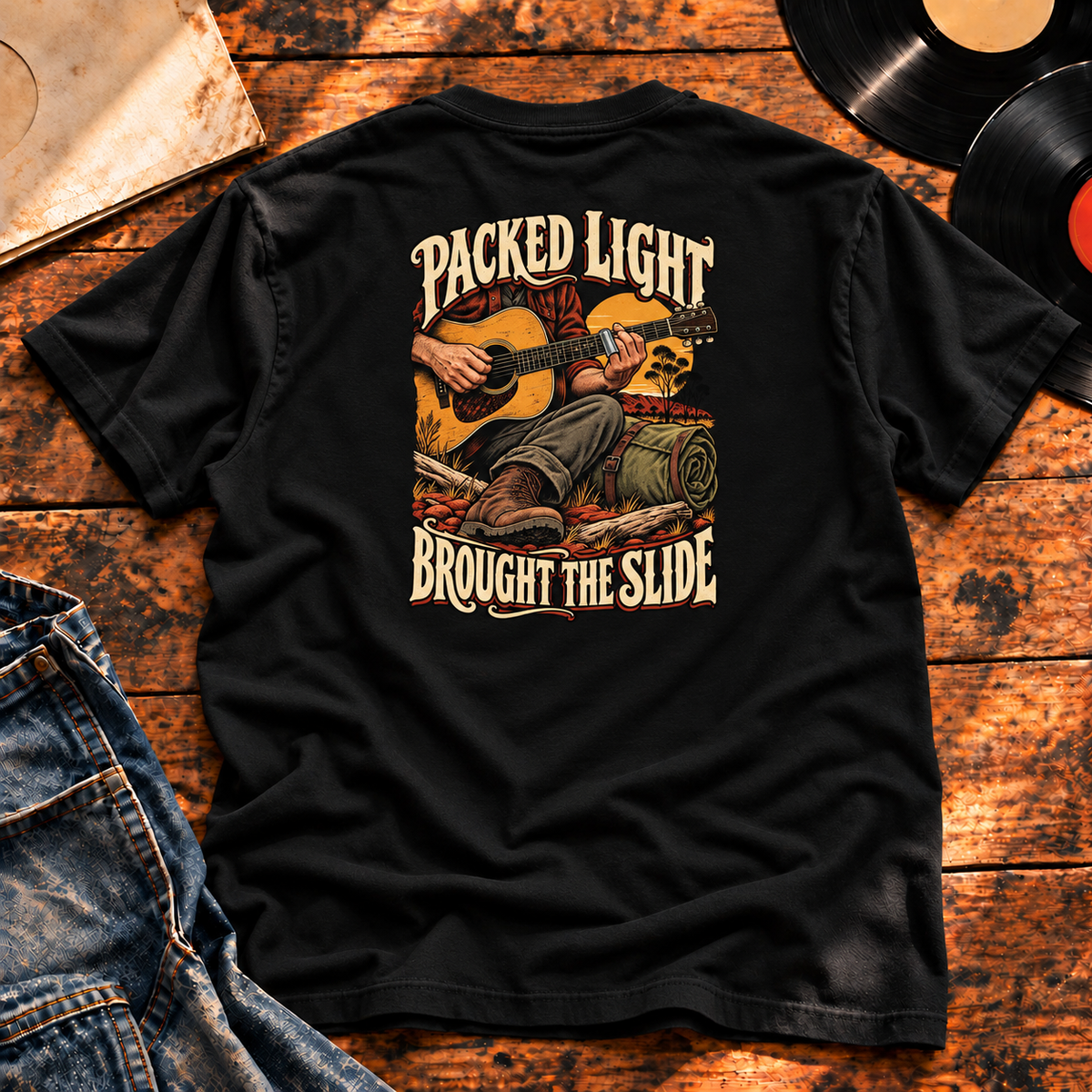 Packed Light Brought the Slide Heavyweight Tee — black back-print hero