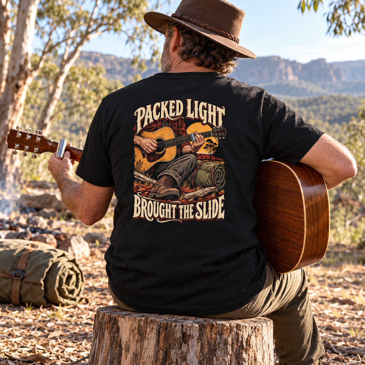 Packed Light Brought the Slide Heavyweight Tee — Black lifestyle photograph