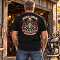 Man wearing the black Decibels & Gasoline T-shirt, back graphic