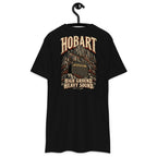 Hobart Mountain Volume Heavyweight Tee — Black, back view on hanger (Printful)