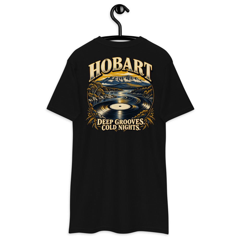Hobart River Groove Heavyweight Tee — Black, back view on hanger (Printful)
