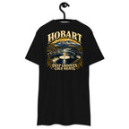 Hobart River Groove Heavyweight Tee — Black, back view on hanger (Printful)