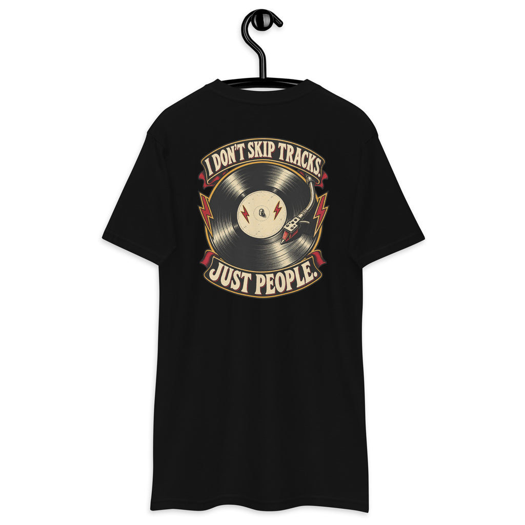 I Donâ€™t Skip Tracks Heavyweight Tee — Black, back view on hanger (Printful)