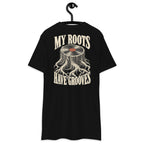 My Roots Have Grooves Heavyweight Tee — Black, back view on hanger (Printful)