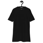 The Music Moved In Heavyweight Tee — Black, front view on hanger (Printful)