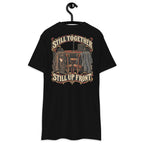 Still Together Still Up Front Heavyweight Tee — Black, back view on hanger (Printful)