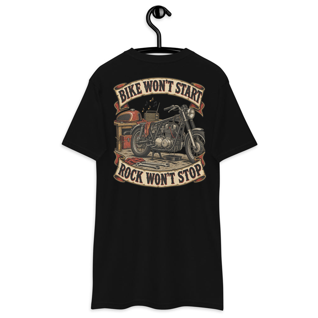Bike Won’t Start Rock Won’t Stop Heavyweight Tee — Black, back view on hanger (Printful)