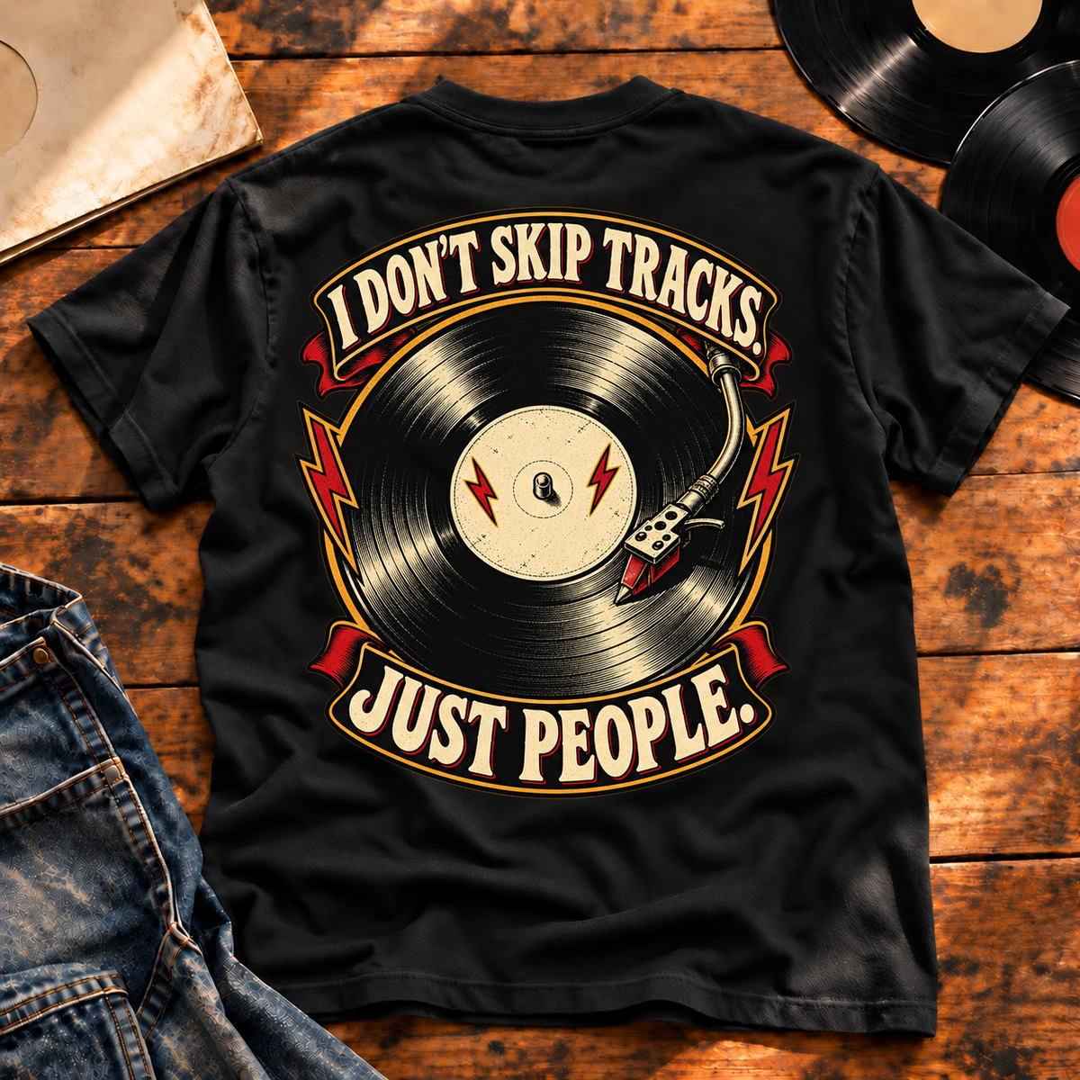 I Don’t Skip Tracks Black heavyweight tee — back print flat-lay hero
