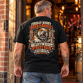 Man wearing the black Beer and Boogie Bulldog T-shirt, showing the back print outside a pub