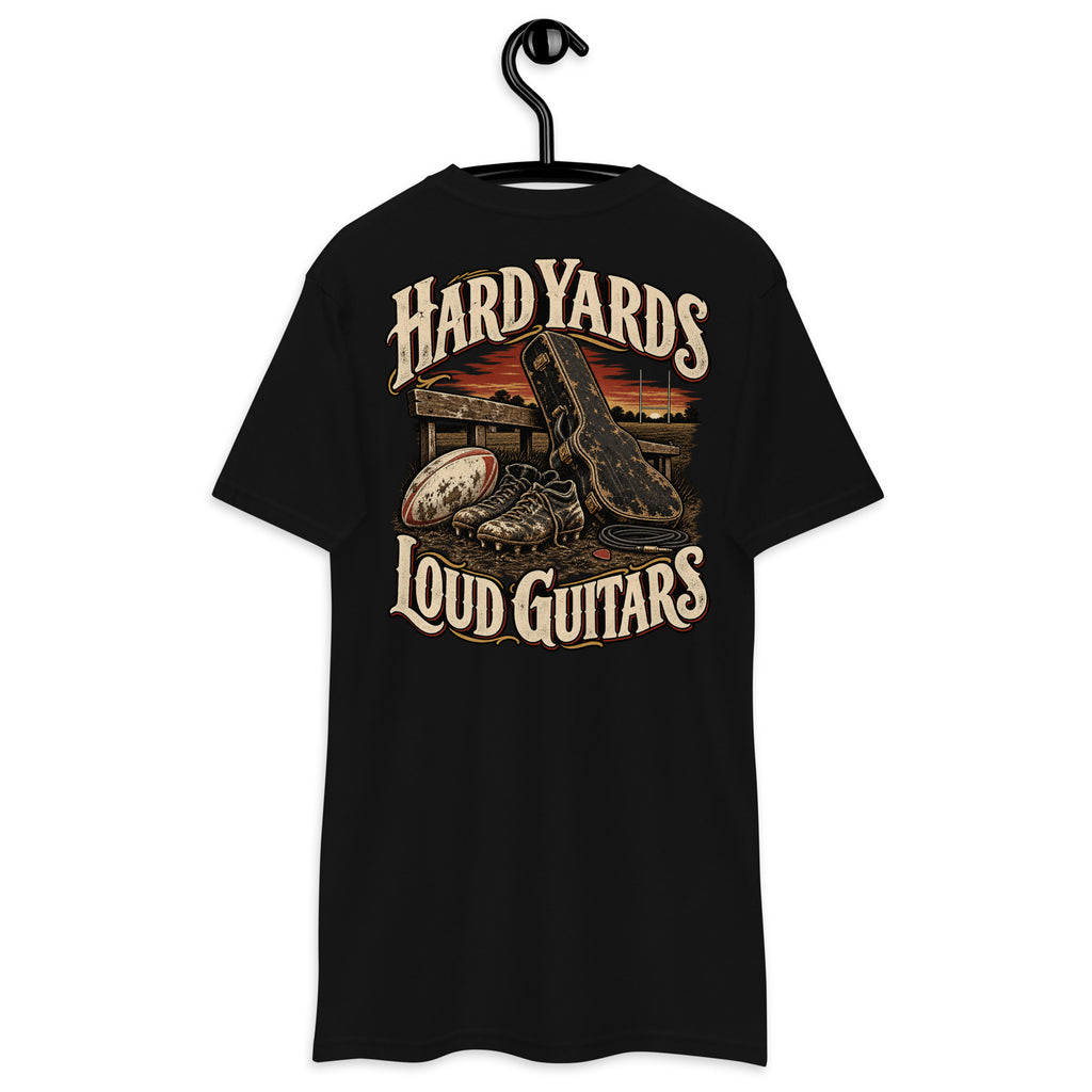 Hard Yards Loud Guitars Heavyweight Tee — Black, back view on hanger (Printful)
