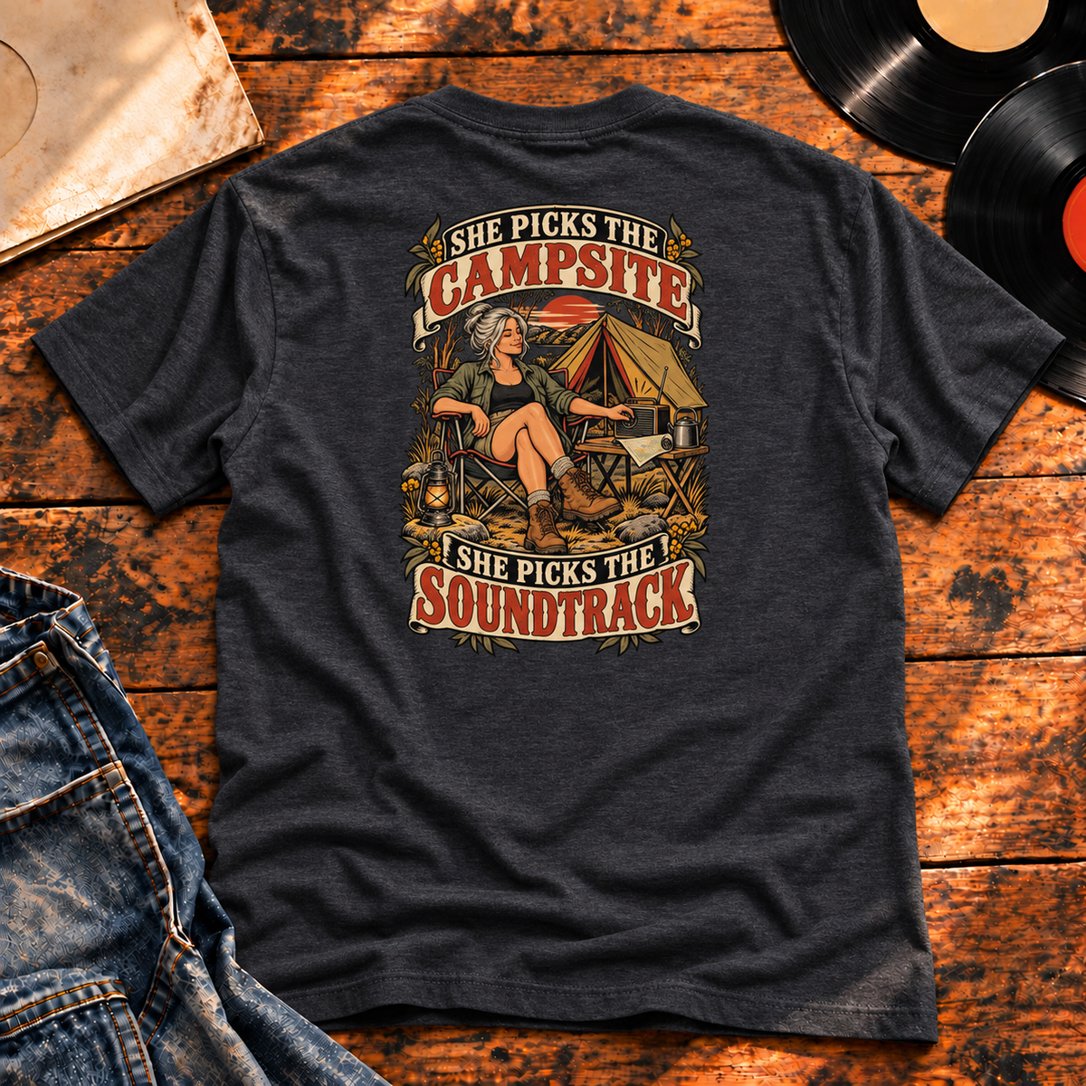 She Picks the Campsite She Picks the Soundtrack Heavyweight Tee — charcoal back-print hero