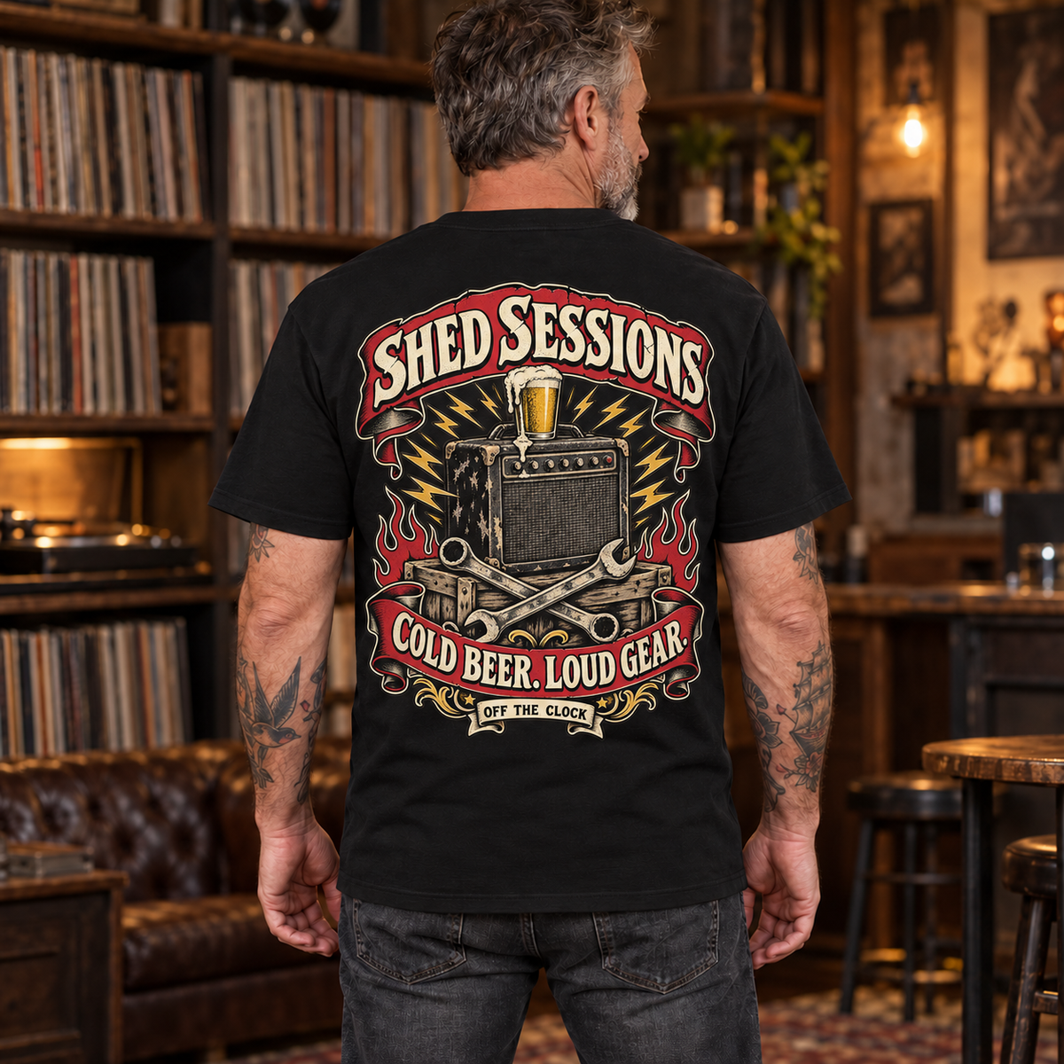 Shed Sessions Heavyweight Tee — mature model wearing the black back-print tee