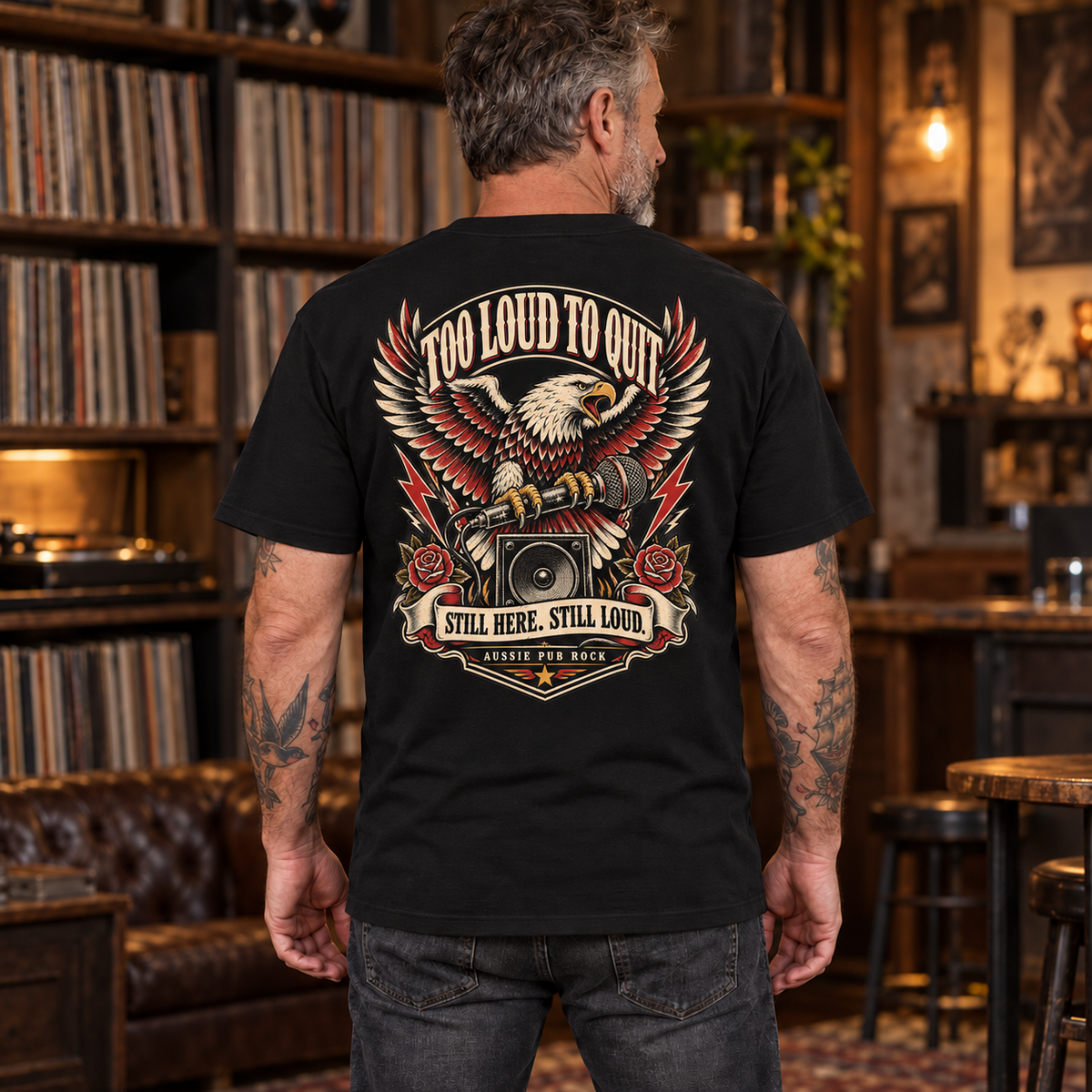 Too Loud to Quit Heavyweight Tee — mature model wearing the black back-print tee
