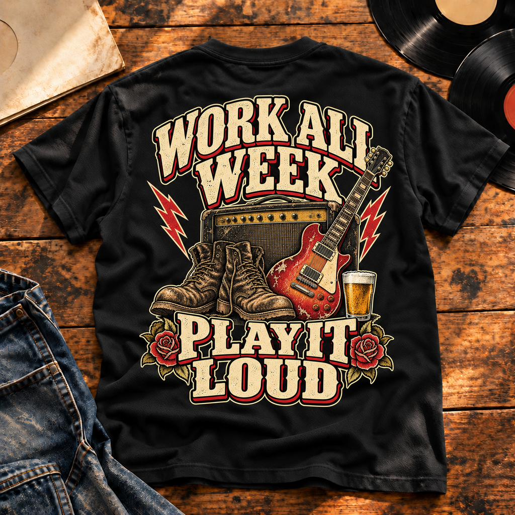 Work All Week Play It Loud heavyweight tee with guitar, boots and amp back print on a wooden table with vinyl records